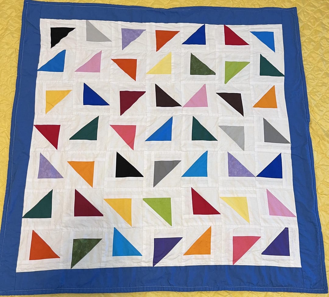 A Modern Triangle Pattern With an Off-centered Twist Baby Quilt - Etsy