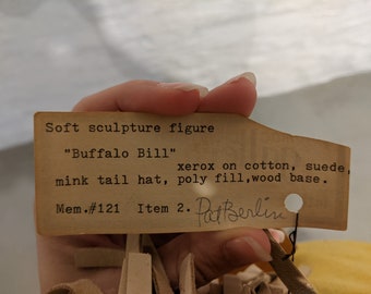 Buffalo bill doll sculpture