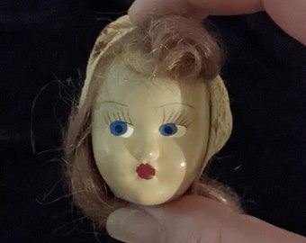 Doll in need of repairs