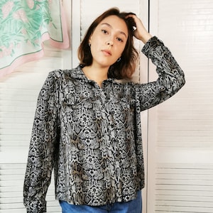 Blusa estampado serpiente deals