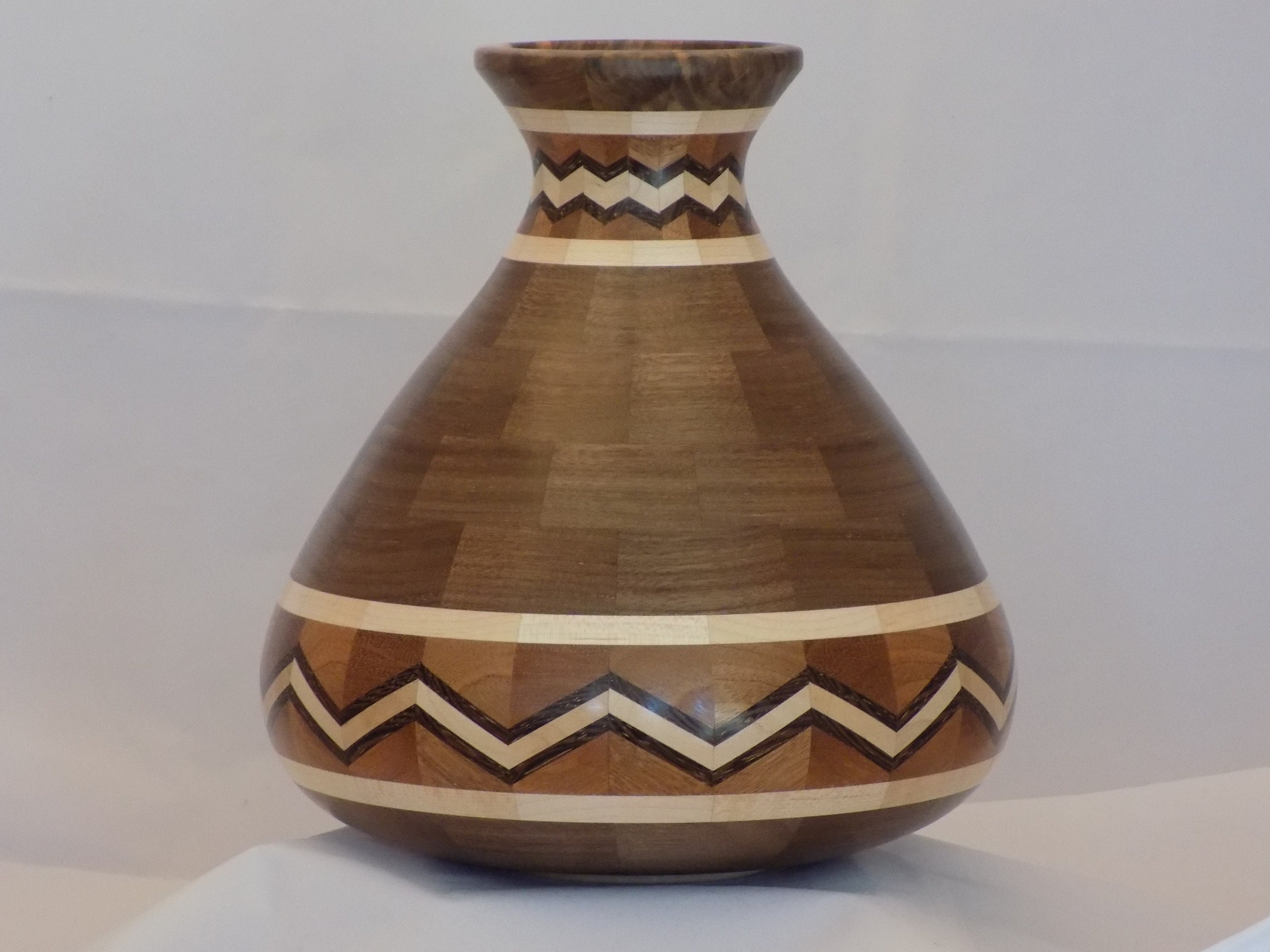 Handmade segmented turned wooden vase with lid made from Etsy