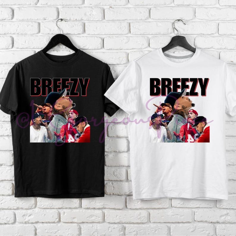 May include: Two t-shirts with a black and white image of a group of people with the word "Breezy" printed in red and black letters.