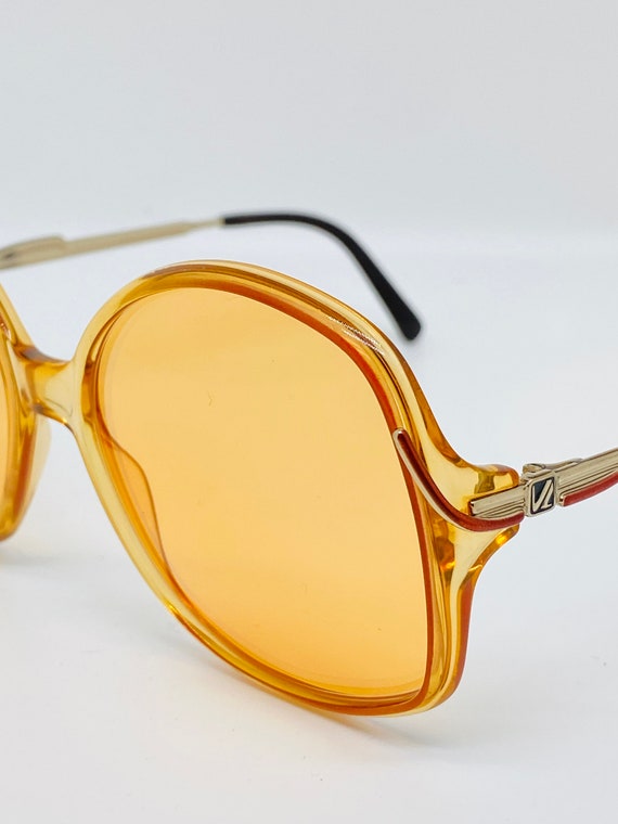 Viennaline orange vintage glasses Vintage Viennaline 136830 53[]14 120 Orange Oval Glasses  main image 2