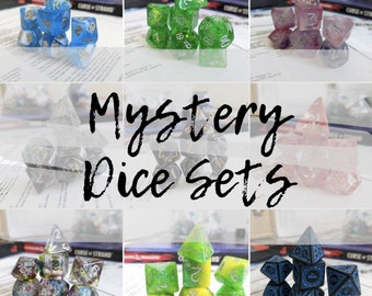 May include: A collage of six different sets of polyhedral dice, each set featuring a different color and style. The dice are made of clear resin with glitter and swirls of color. The sets are arranged in a grid pattern with the text "Mystery Dice Sets" in the center.