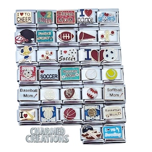 May include: A collection of 20 silver charm bracelets with various sports-themed designs. The charms feature different sports, including soccer, baseball, basketball, softball, football, and bowling. The charms also include phrases like "I Love Soccer" and "Cheer Mom".