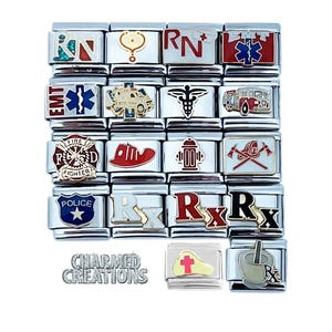 May include: A collection of 18 silver charm bracelet charms featuring various symbols and designs, including a red cross, a stethoscope, a fire hydrant, a fire truck, a police badge, and the letters "RN" and "RX". The charms are arranged in three rows on a white background. The text "CHARMED CREATIONS" is visible at the bottom of the image.