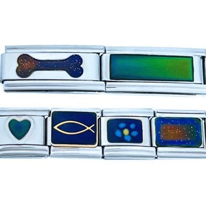 May include: A silver charm bracelet with interchangeable charms. The charms include a bone, a fish, a flower, and a speckled design.