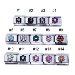 May include: Fourteen silver charm bracelet links with different colored flower designs. Each link features a flower with a different colored crystal center.