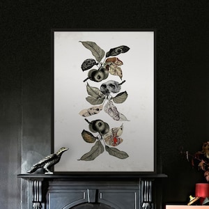 May include: A black and white framed print of a stylized illustration of a branch with apples. The apples are decorated with eyes, skulls, and other details. The print is hanging on a black wall above a fireplace.