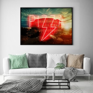 May include: A neon sign with the word "PIZZA" in red letters, with a lightning bolt in the middle, in front of the Colosseum in Rome, Italy.