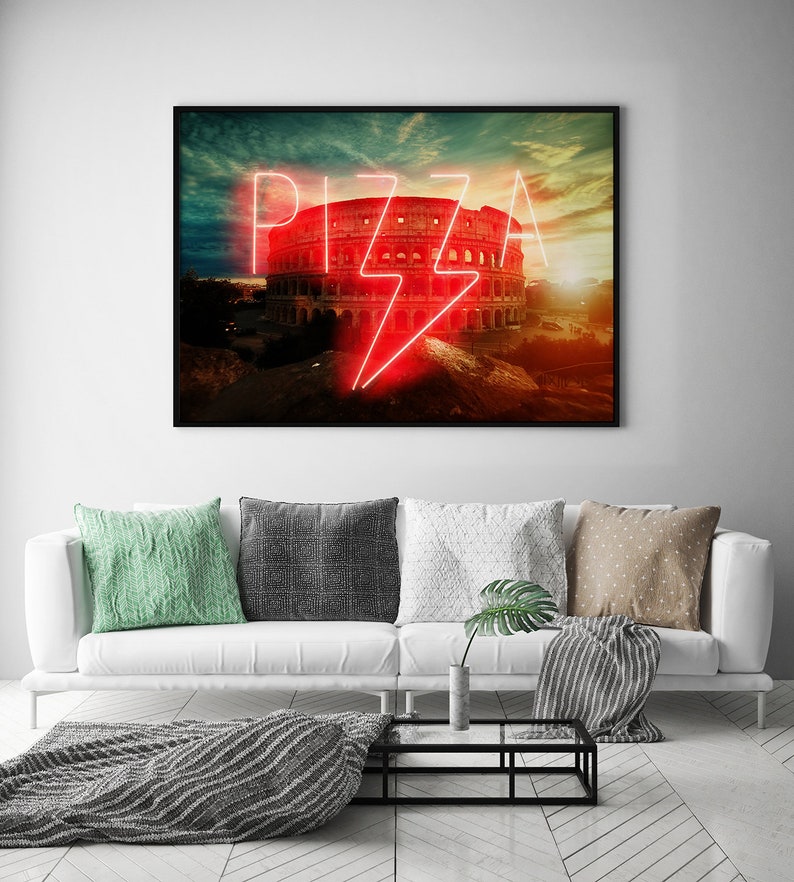 May include: A neon sign with the word "PIZZA" in red letters, with a lightning bolt in the middle, in front of the Colosseum in Rome, Italy.