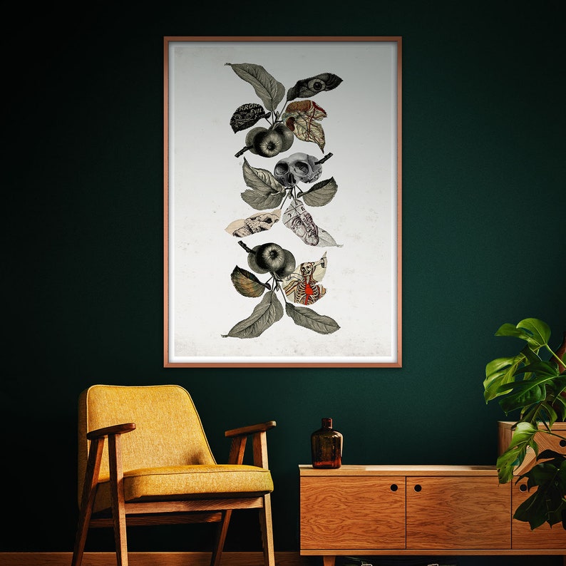 May include: A framed print of a botanical illustration featuring a stylized apple tree with anatomical details, including a skull, an eye, and a skeleton. The artwork is on a white background with a brown frame.