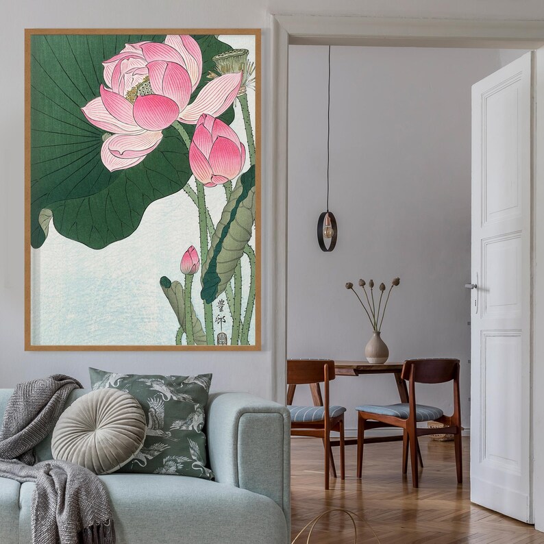 May include: A framed print of a Japanese-style illustration of pink lotus flowers with green leaves. The print features the Japanese characters "蓮華" (renka) which means "lotus flower".