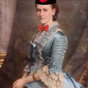 May include: A woman in a blue dress with lace trim and a red bow tie. She is wearing a black Mickey Mouse hat with a red center circle.