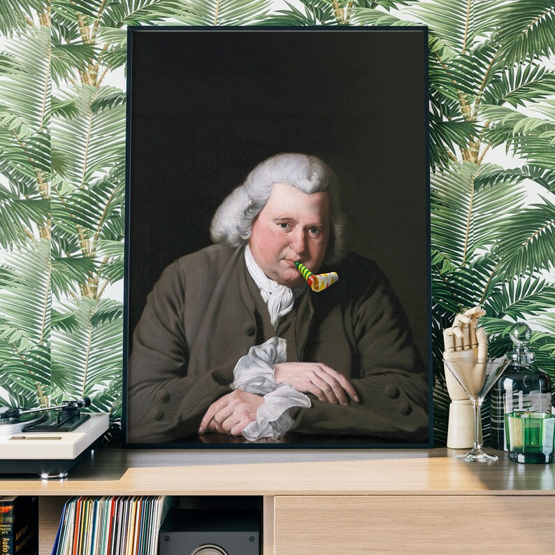 May include: A framed portrait of a man in a dark suit and white cravat, holding a green and yellow party blower in his mouth. The background is a dark brown.