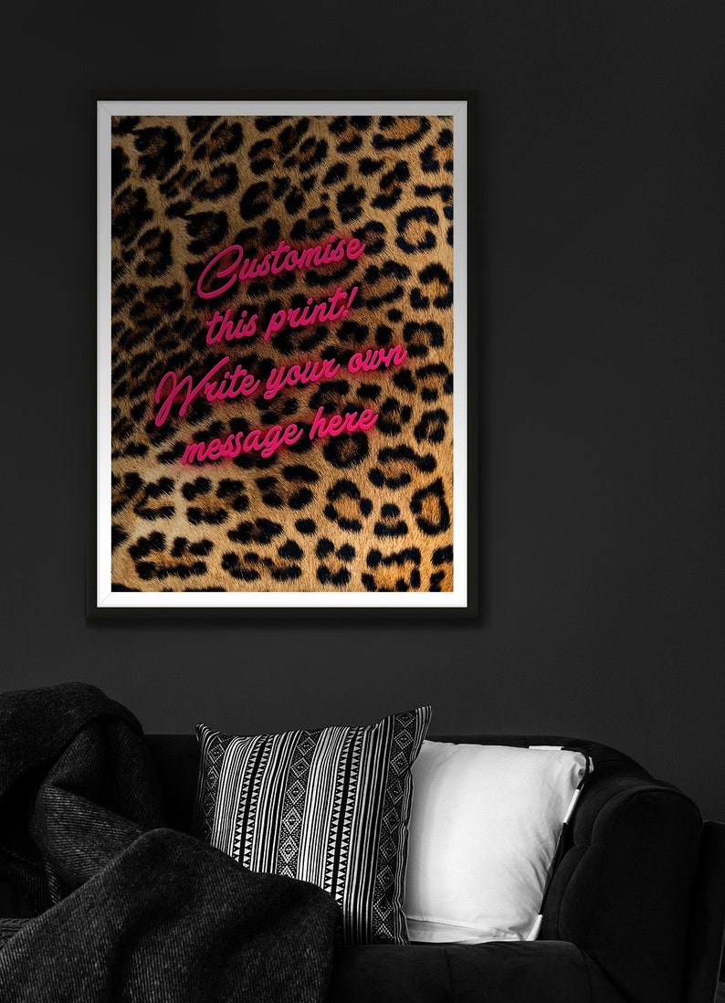 May include: A framed print with a leopard print background and pink text that says "Customise this print! Write your own message here."