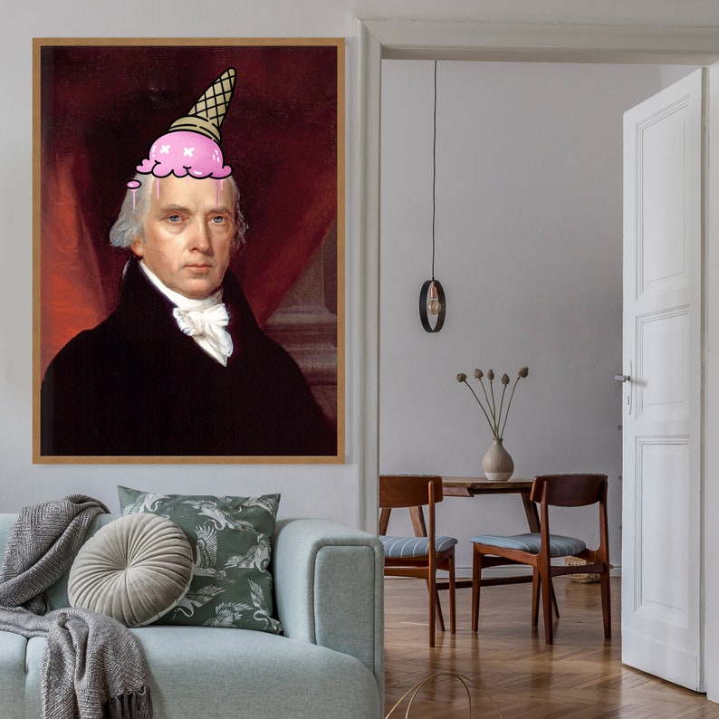 May include: A portrait of a man with a pink ice cream cone on his head. The man is wearing a black suit and a white shirt. The background is a red curtain.