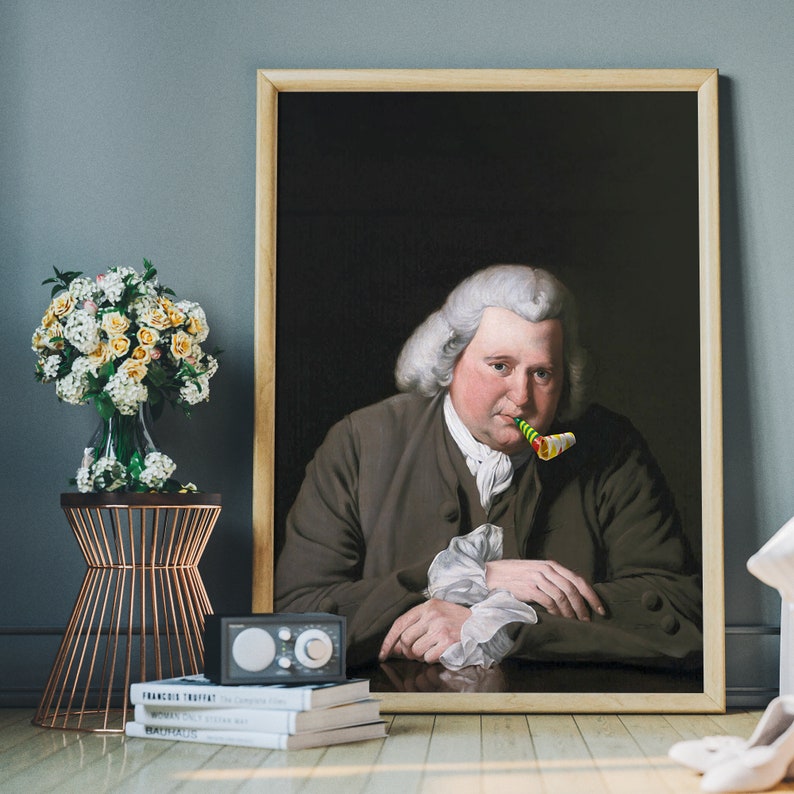 May include: A framed portrait of a man in a brown coat with a white collar and a white wig. He is holding a colorful party blower in his mouth. The portrait is set against a dark background.