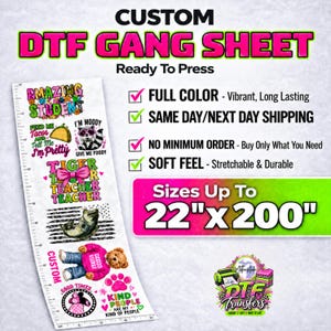 May include: A custom DTF gang sheet featuring various colorful graphic designs including a taco, a raccoon, a tiger, a fish, and a teddy bear. The sheet is displayed next to a ruler showing dimensions up to 24 inches wide and 200 inches long.