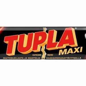 Peut inclure: Barre chocolatée emballée avec le texte "TUPLA MAXI" en rouge et jaune. L'emballage est noir avec des accents rouges et oranges. La barre chocolatée a un logo de certification UTZ cocoa.