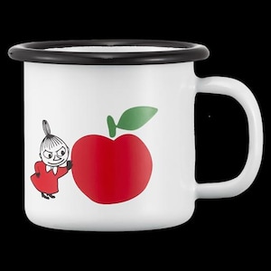 May include: White enamel mug with a black rim and handle. The mug features a cartoon illustration of a character in a red dress, next to a large red apple with a green leaf. A fun, whimsical design.