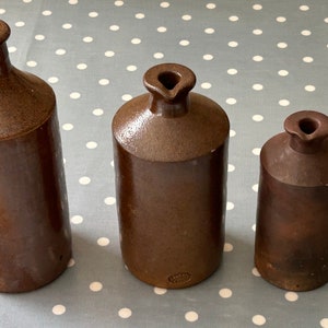 A trio of rare Stoneware Ink Bottles by Lovatt & Lovatt and Bourne Denby
