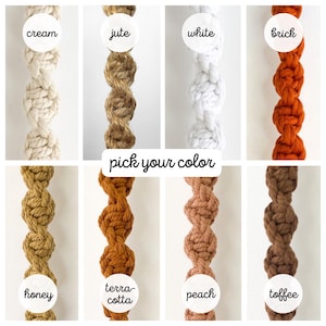 May include: A selection of knotted rope in various colors, including cream, jute, white, and brick. The image displays the text "pick your color" and also features honey, terracotta, peach, and toffee colored ropes. Each rope is a different shade.