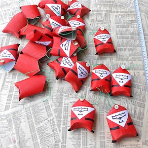 Calendario dell'avvento o scatole regalo a forma di Babbo Natale, decorazioni natalizie o scatoline per bomboniere