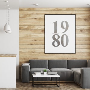 wall paper decoration numbers shape silhouette framed to the wall in a living room,