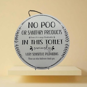 No Poo or sanitary products in this toilet, no poo signs, bathroom signs