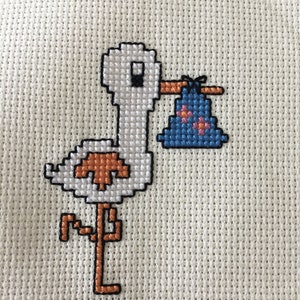 Cross-stitched stork