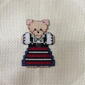 Cross-stitched Bear in traditional Swedish dress