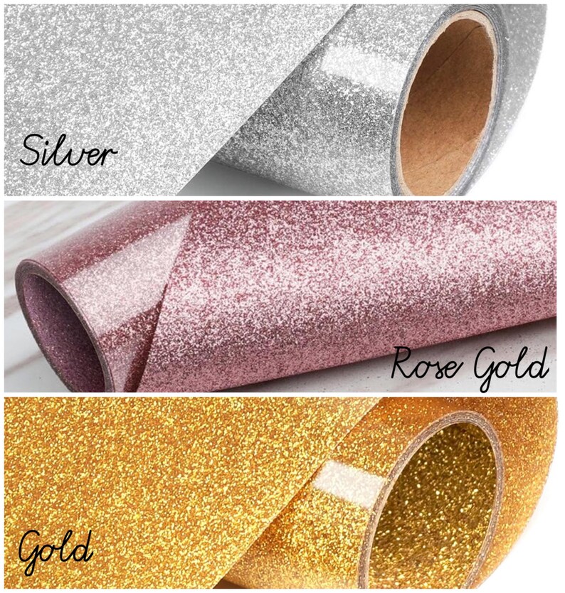 Puede incluir: Tres rollos de tela de purpurina en plata, oro rosa y oro. La tela est&aacute; enrollada y los extremos son visibles.