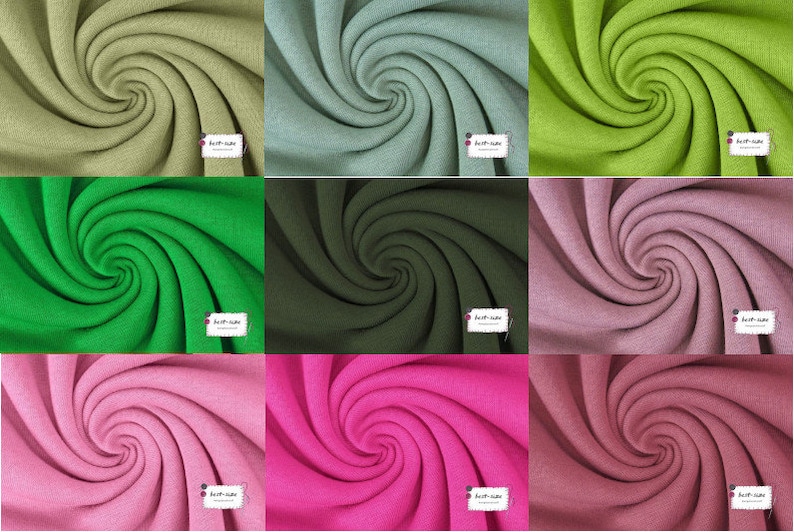 May include: A collection of nine fabric swatches in various colors, including green, pink, and brown. Each swatch is rolled into a spiral shape, showcasing the texture of the fabric.