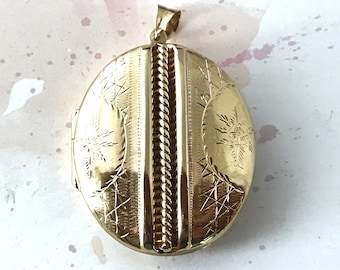 Large Antique Oval Locket Pendant with Engraved Decoration to both sides in 9 ct Solid Yellow Gold - 5 cm x 4 cm x 1.3 cm - Weight 19.4 g's