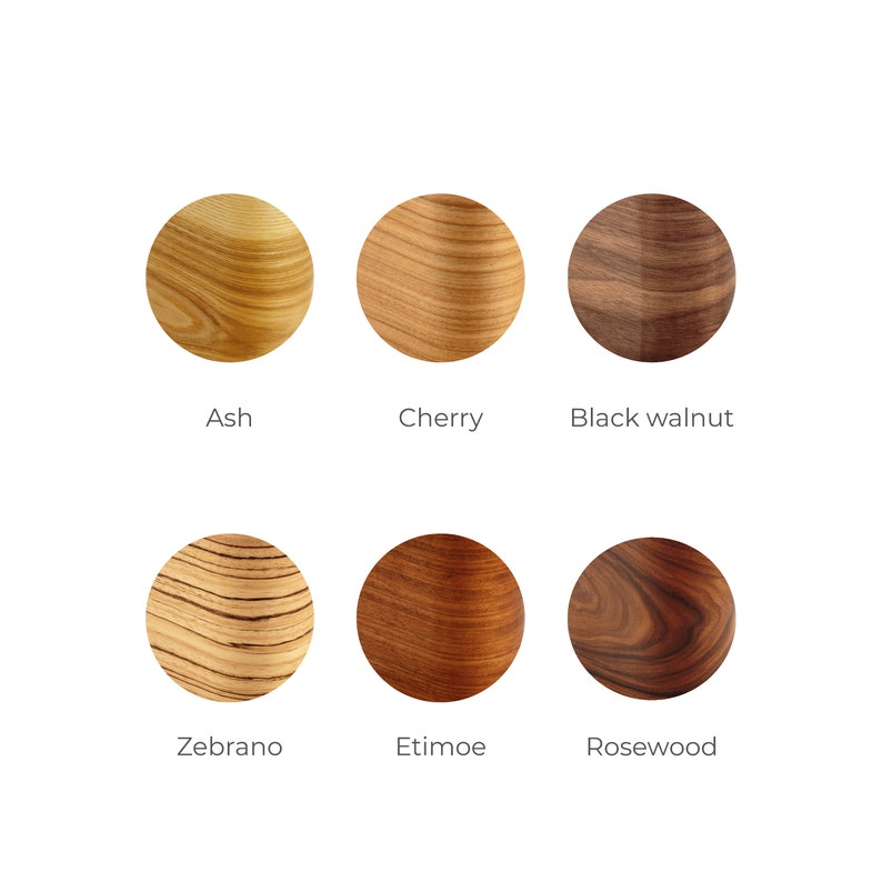 Puede incluir: Primer plano de seis patrones de veta de madera diferentes: fresno, cerezo, nogal negro, madera de zebra, etimoe y palo de rosa.