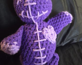Purple voodoo doll