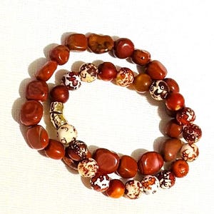 University of Texas Longhorns colored beaded bracelet