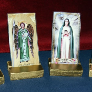 Mini golden handcrafted altar stand for holy cards.