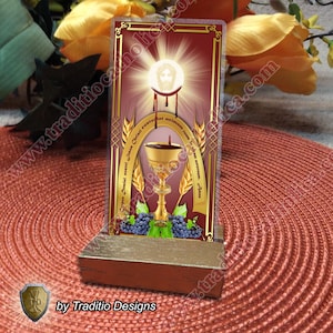 Estampa laminada de la Sagrada Eucaristía y de la Santa Oración Provida. Colección de estampas de los sacramentos.