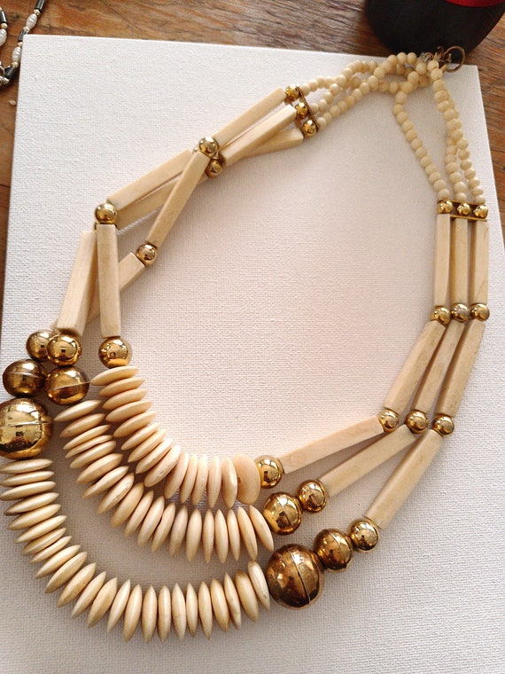 Boho Tribal Vintage Bone and Brass beads .