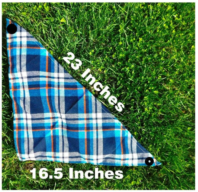 May include: A blue and white plaid bandana with orange accents. The bandana is 23 inches long and 16.5 inches wide.
