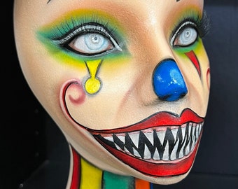 Etalagepop hoofd kwade clown