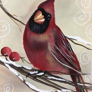 Könnte beinhalten: Ein roter Kardinal sitzt auf einem schneebedeckten Ast mit roten Beeren. Der Vogel hat einen schwarzen Kopf und einen leuchtend orangefarbenen Schnabel. Der Hintergrund ist hellbeige mit weißen Wirbeln.