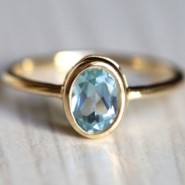 Aquamarine engagement ring, Aquamarine ring, Oval cut engagement  ring, March birthstone, Basic bezel set aquamarine ring in Solid Gold