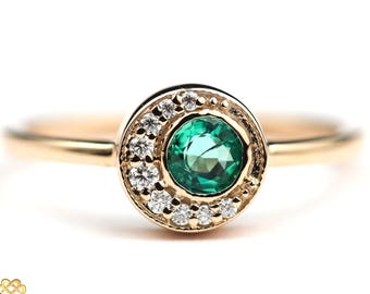 Massief gouden smaragdgroene diamanten zon-maanclusterring verloving