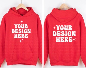 May include: A bright red hooded sweatshirt featuring the white text "YOUR DESIGN HERE" in a bold, wavy font on both the front and back. The design includes small white four-pointed star accents above and below the text on the front and sides.