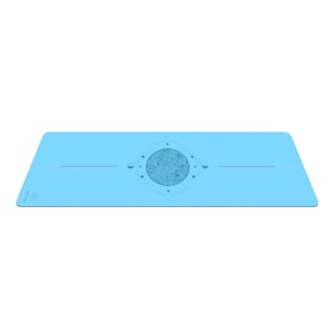 May include: A light blue yoga mat with a geometric design featuring a circle with a textured pattern and a crescent moon on each side. The mat has the text "OM" in the bottom left corner.