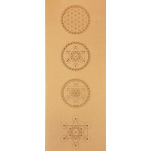 May include: A brown cork yoga mat with four geometric designs printed on it. The designs are in a circle and include a flower of life, a star of david, a metatron's cube, and a sacred geometry design. The text "SEIKA YOGA" is printed in the bottom right corner of the mat.