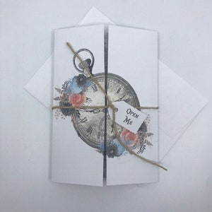 20 Gatefold Alice in Wonderland Invitations, 20 Bridal Shower tags and 20 Alice Party Favors in various pastel teacups